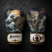 Dark blue and gold boxing gloves featuring a Japanese dragon, ocean wave, Mount Fuji, koi fish, and Torii gate art design for combat sports training.