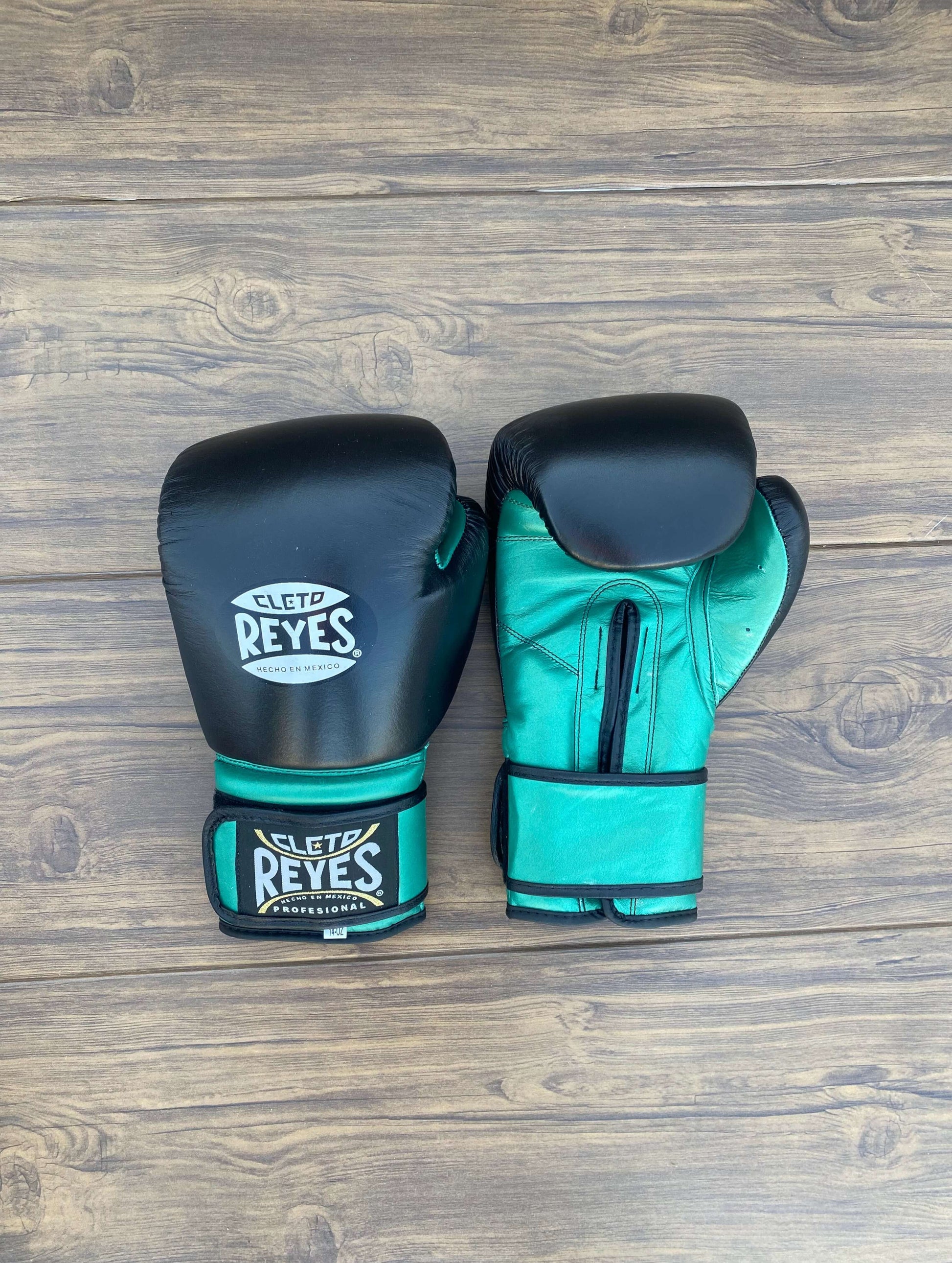 Cleto Reyes Black/Green Leather Boxing Gloves Professional Training Pair Front View