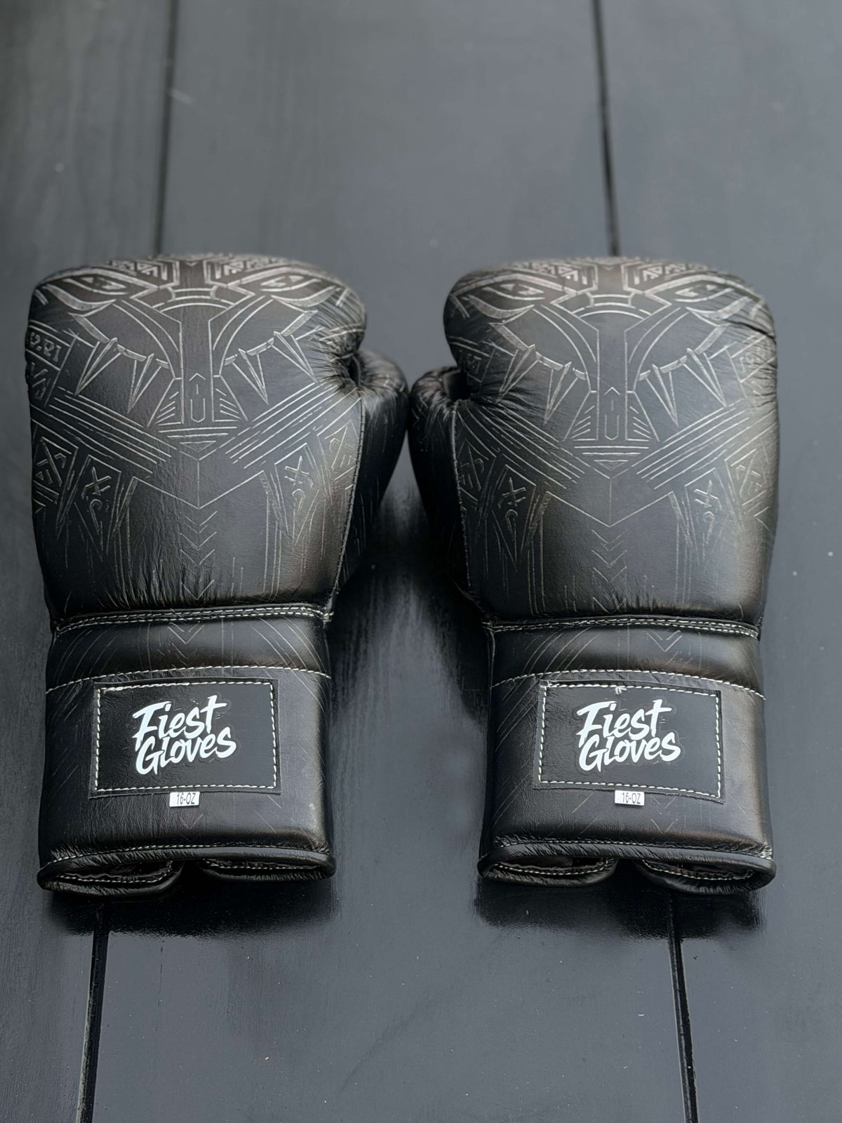 Fiest Panther Style Black Boxing Gloves - Back view showing intricate panther print design and Fiest Gloves logo on the wrist strap.