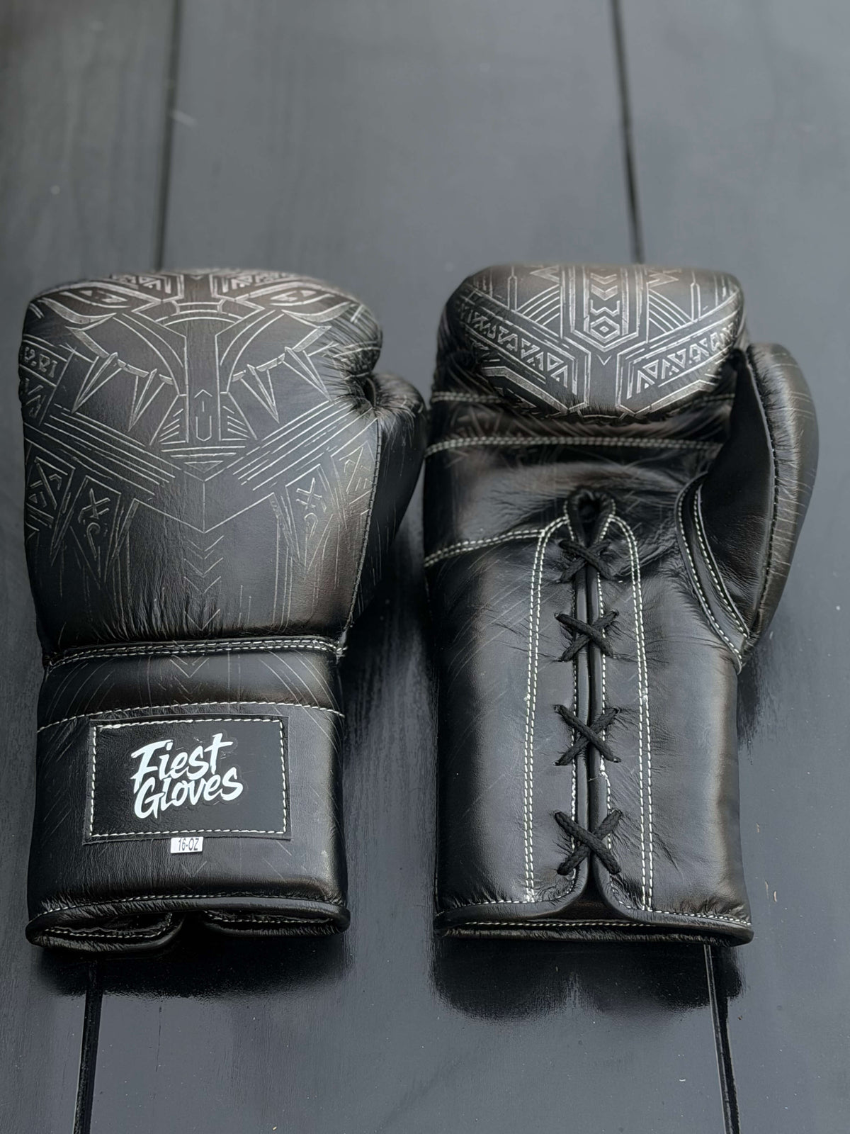 Fiest Panther Style Black Boxing Gloves - Front view showing intricate panther print design and Fiest Gloves logo on the wrist strap.