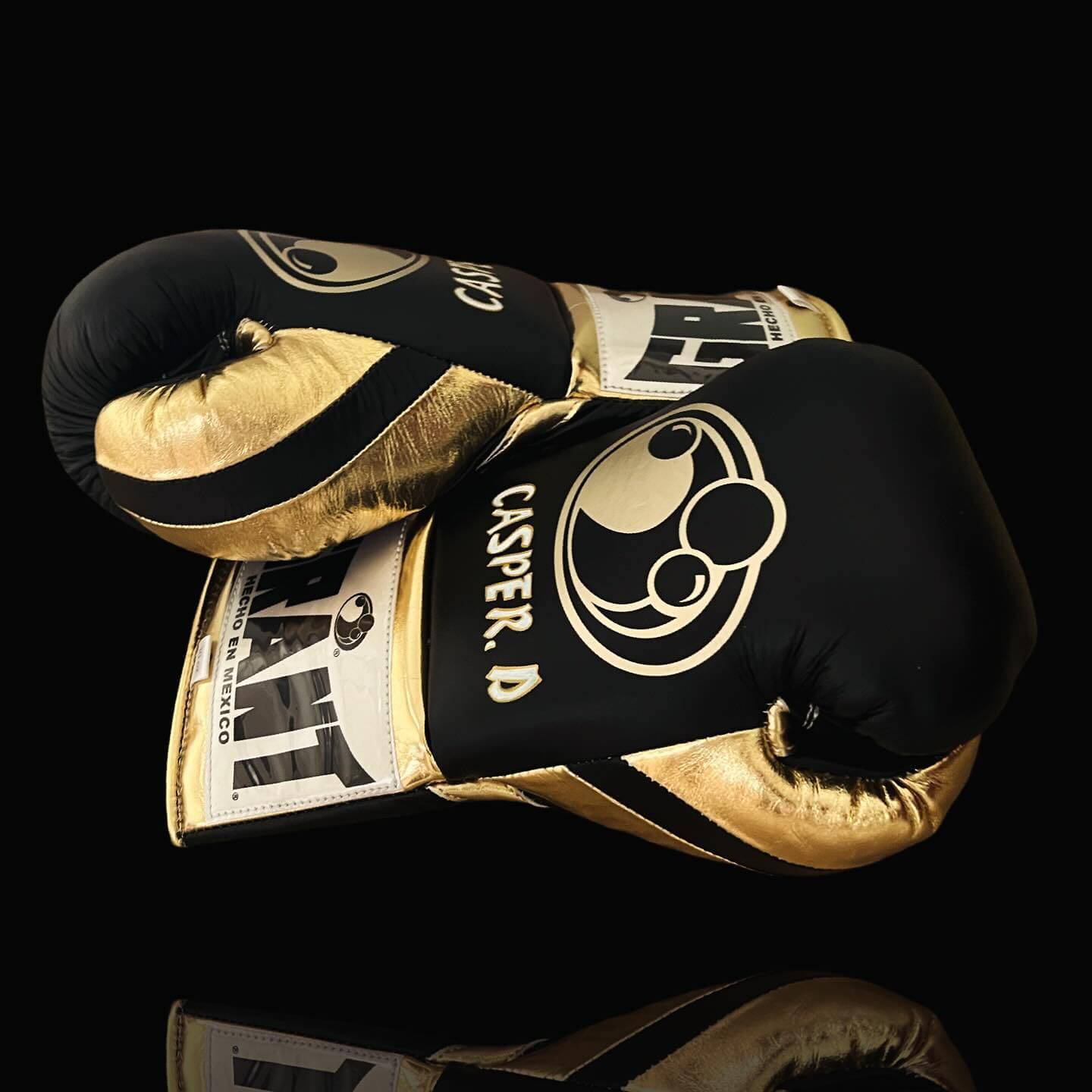 Grant Boxing Gloves Black/Gold on Hands Training Action Shot Thumb View