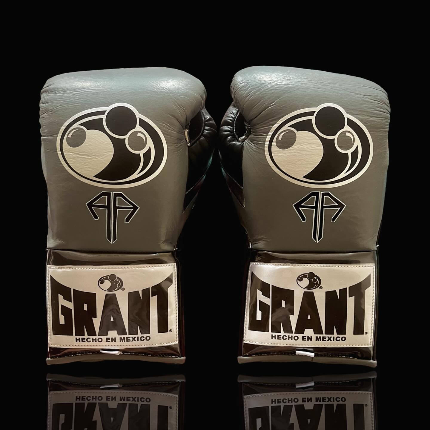 Grant Boxing Gloves Grey/Gold on Hands Training Action Shot Back View