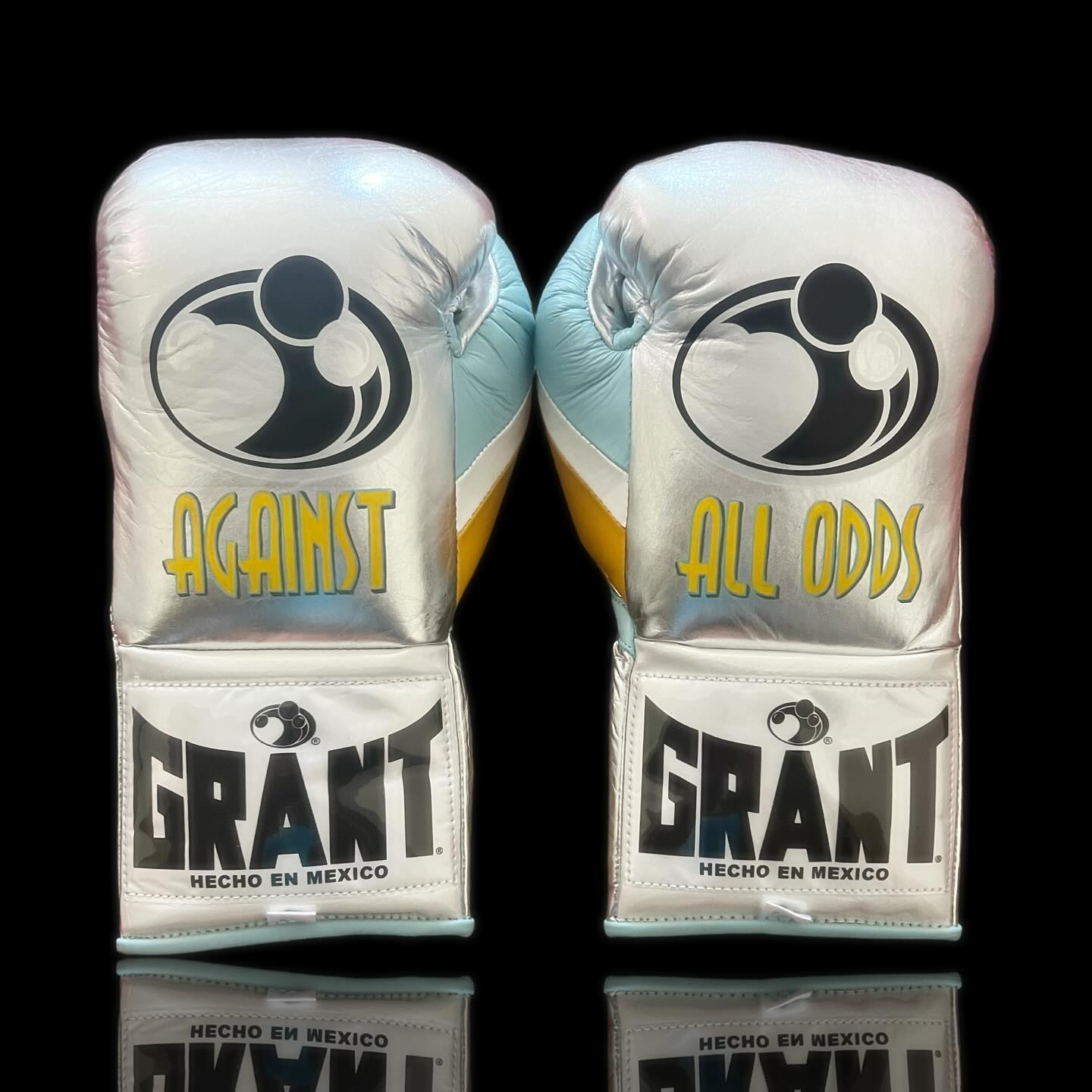 Grant Boxing Gloves Silver/Blue/Yellow on Hands Training Action Shot Back View