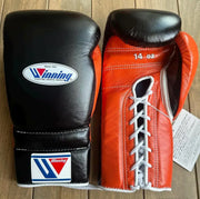 Winning Black/Orange Lace-Up Boxing Gloves Close Up Detail
