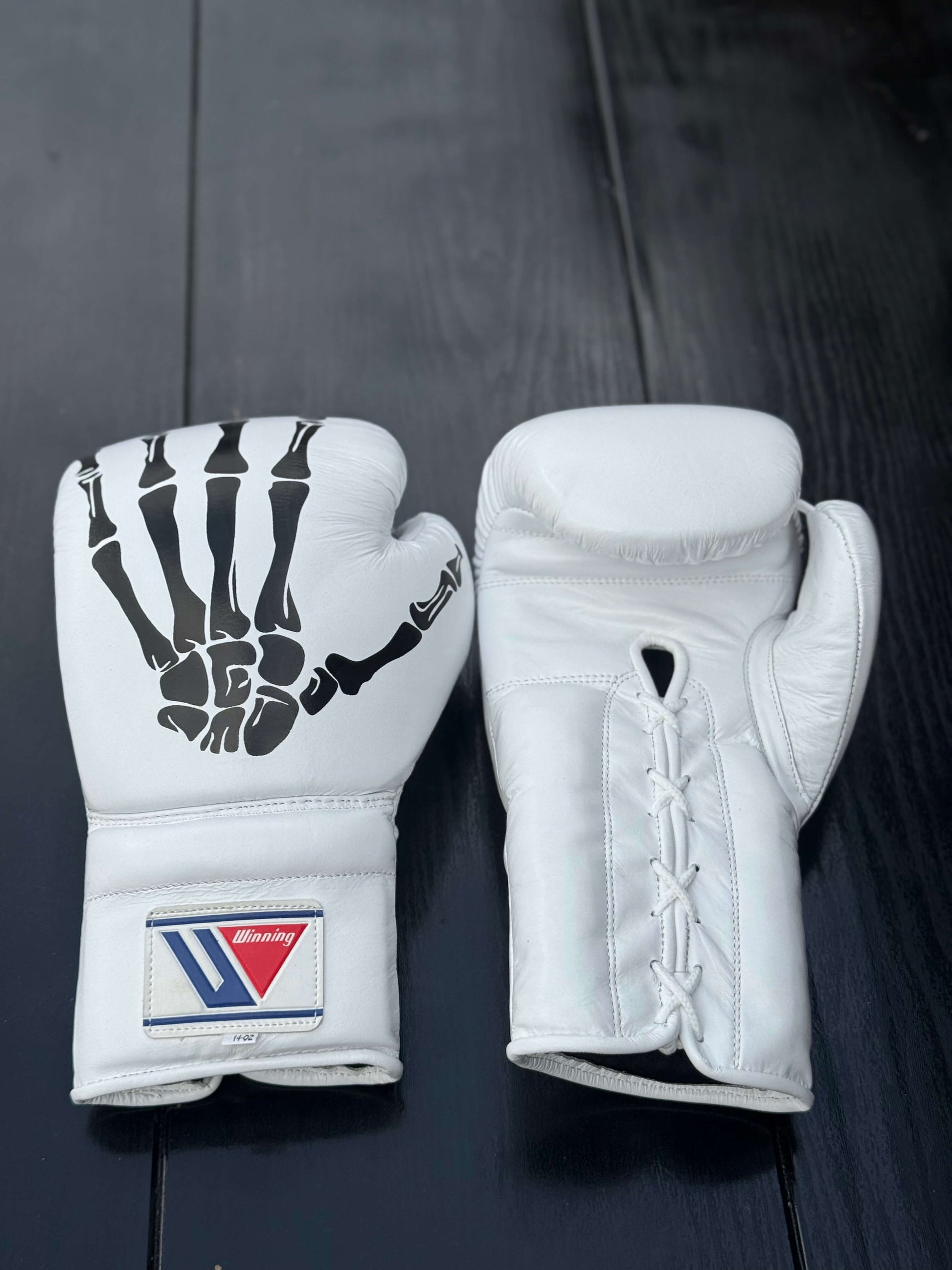 winning boxing gloves white skeleton style front and back view best or sparring and training sessions