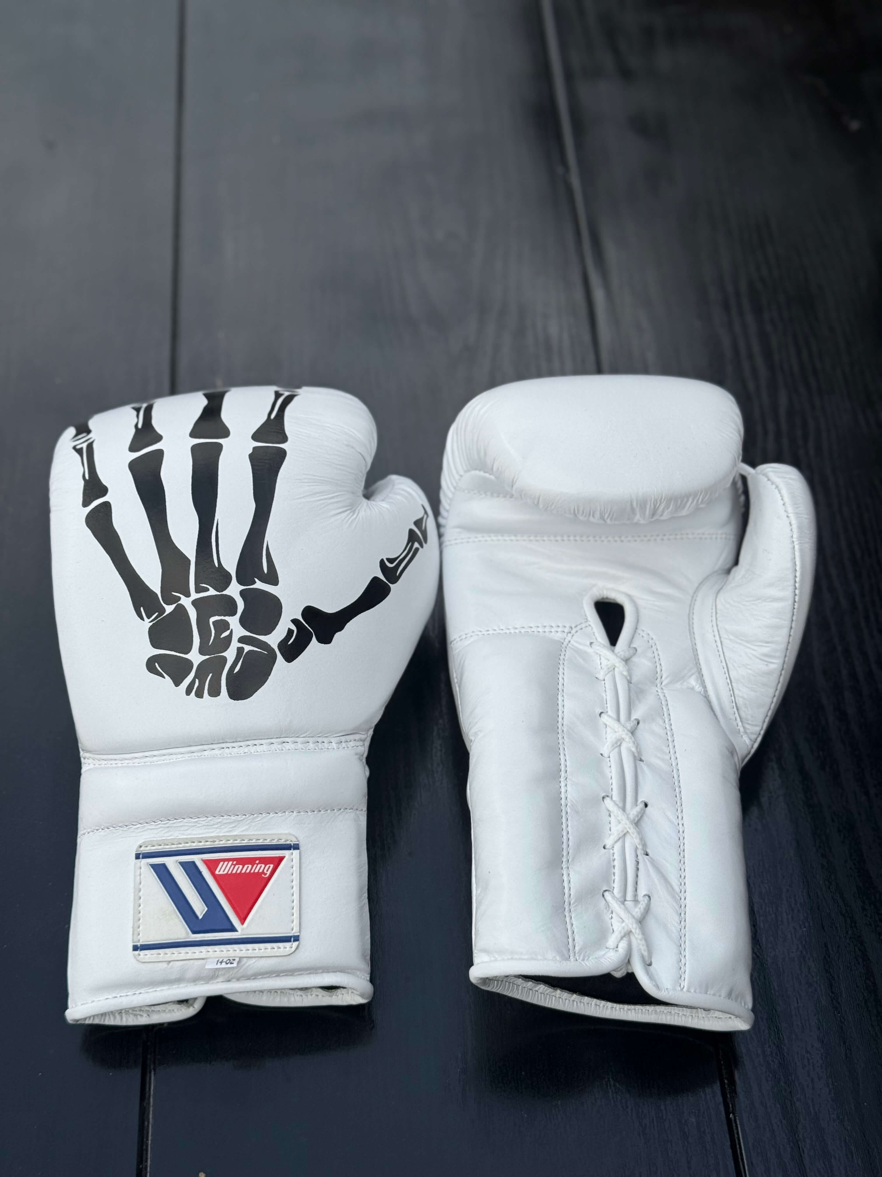 winning boxing gloves white skeleton style front and back view best or sparring and training sessions