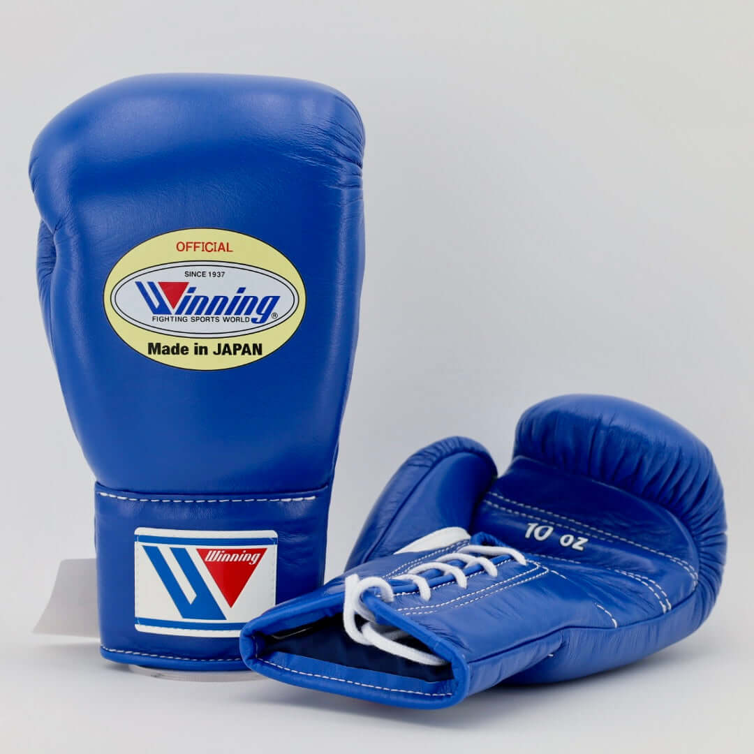 Winning Boxing Gloves Blue on Hands Training Action Shot
