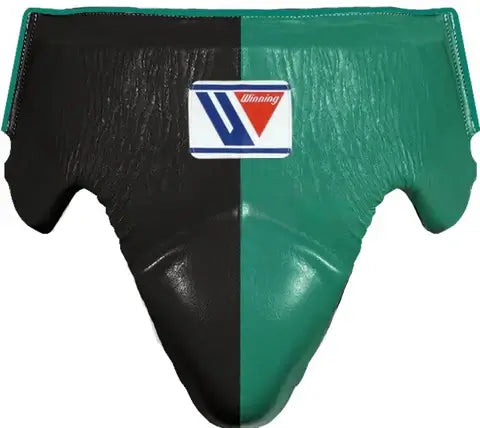 Winning Black/Green Groin Protector on Athlete Training Action Shot