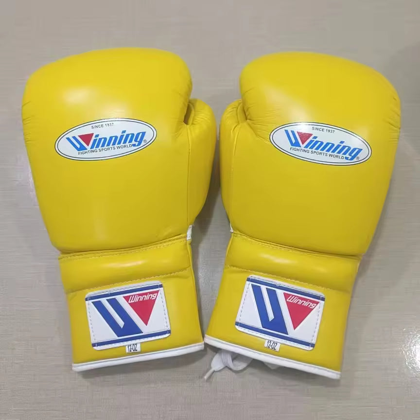 Winning boxing gloves yellow back view for heavy bag and sparring