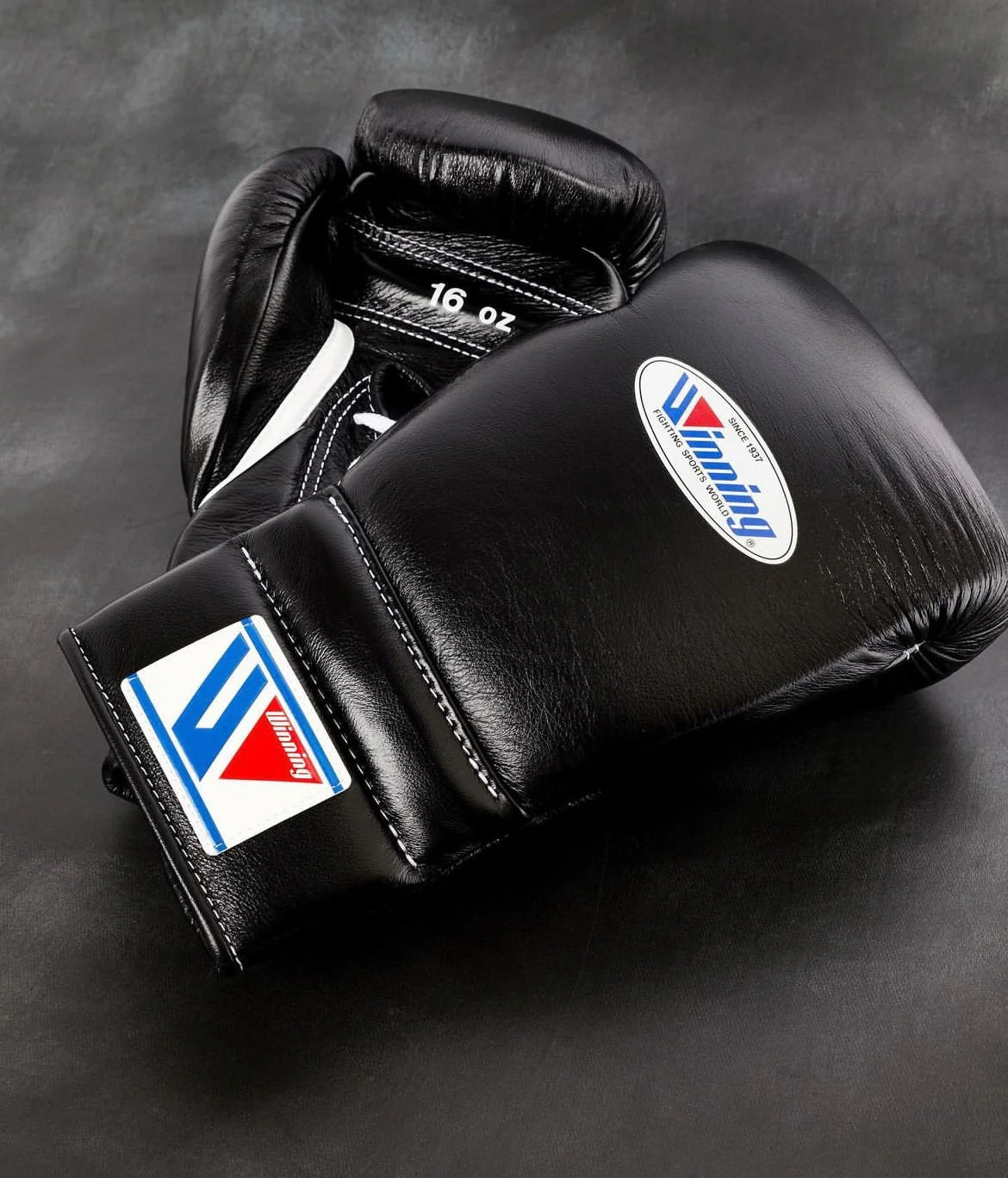 Winning boxing gloves Black lace up back front view high quality sparring gloves