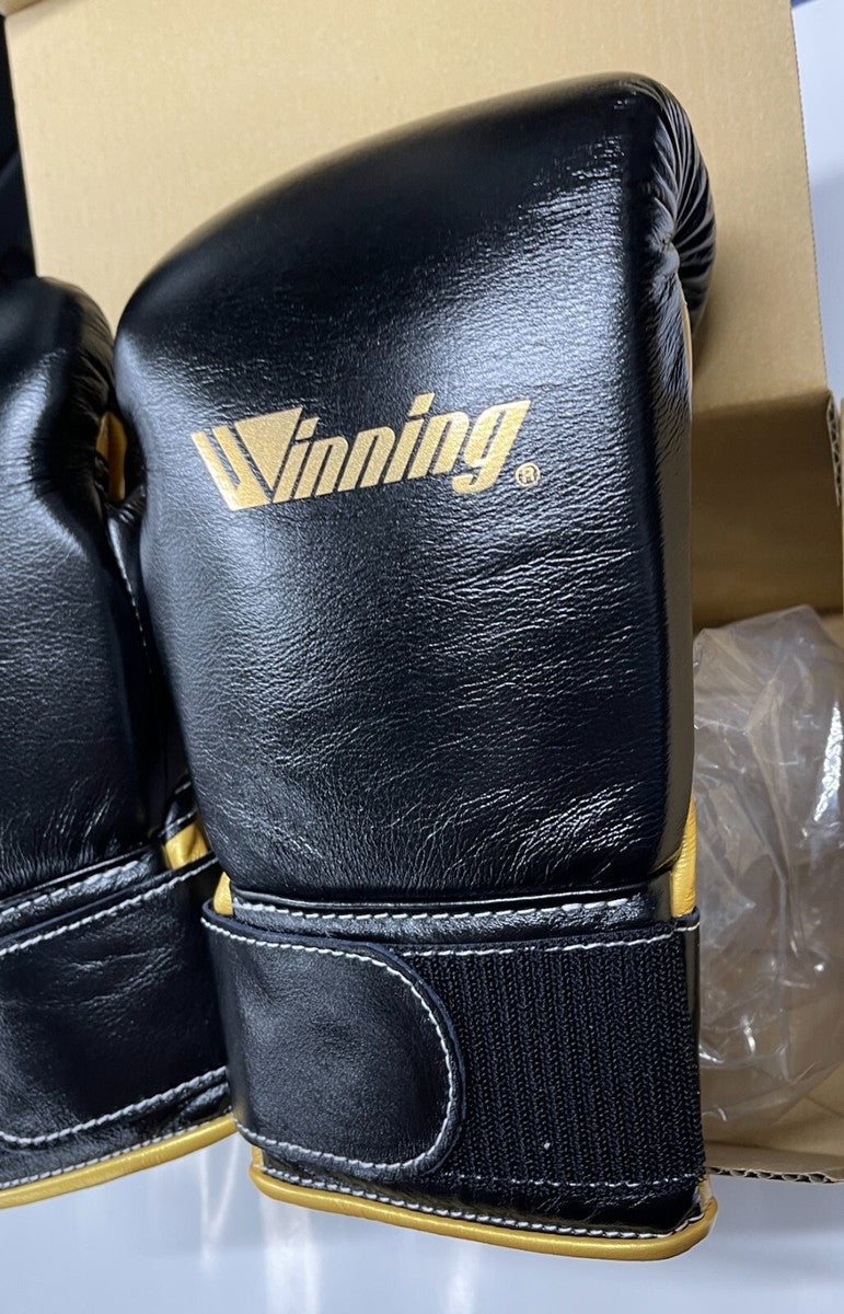 Winning Black/Gold Boxing Gloves Close View