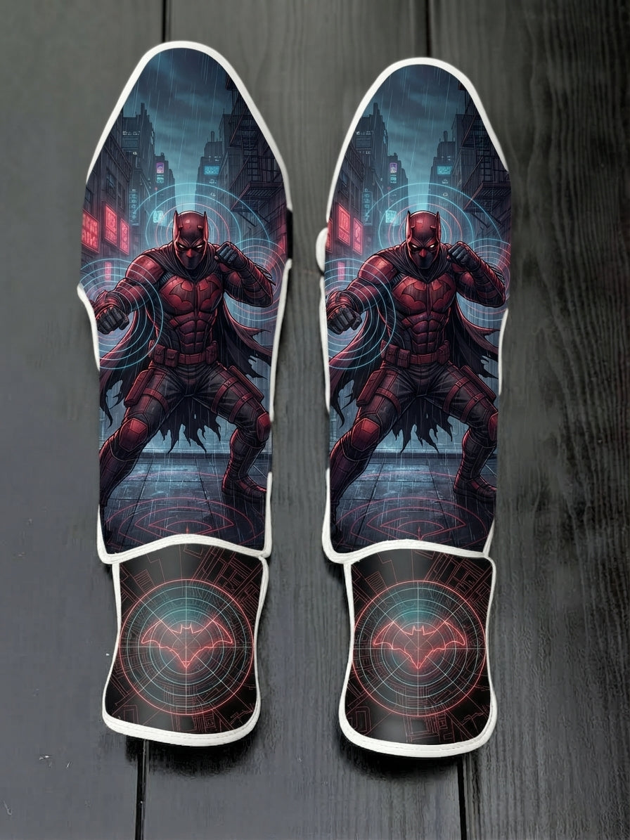 Custom Batman superhero design with dark red and black tactical armor, cyberpunk city backdrop, sonar waves, and red glowing bat emblem soccer shin guards displayed on a dark surface.