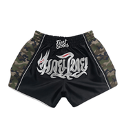 Black Muay Thai kickboxing shorts elastic waistband close-up