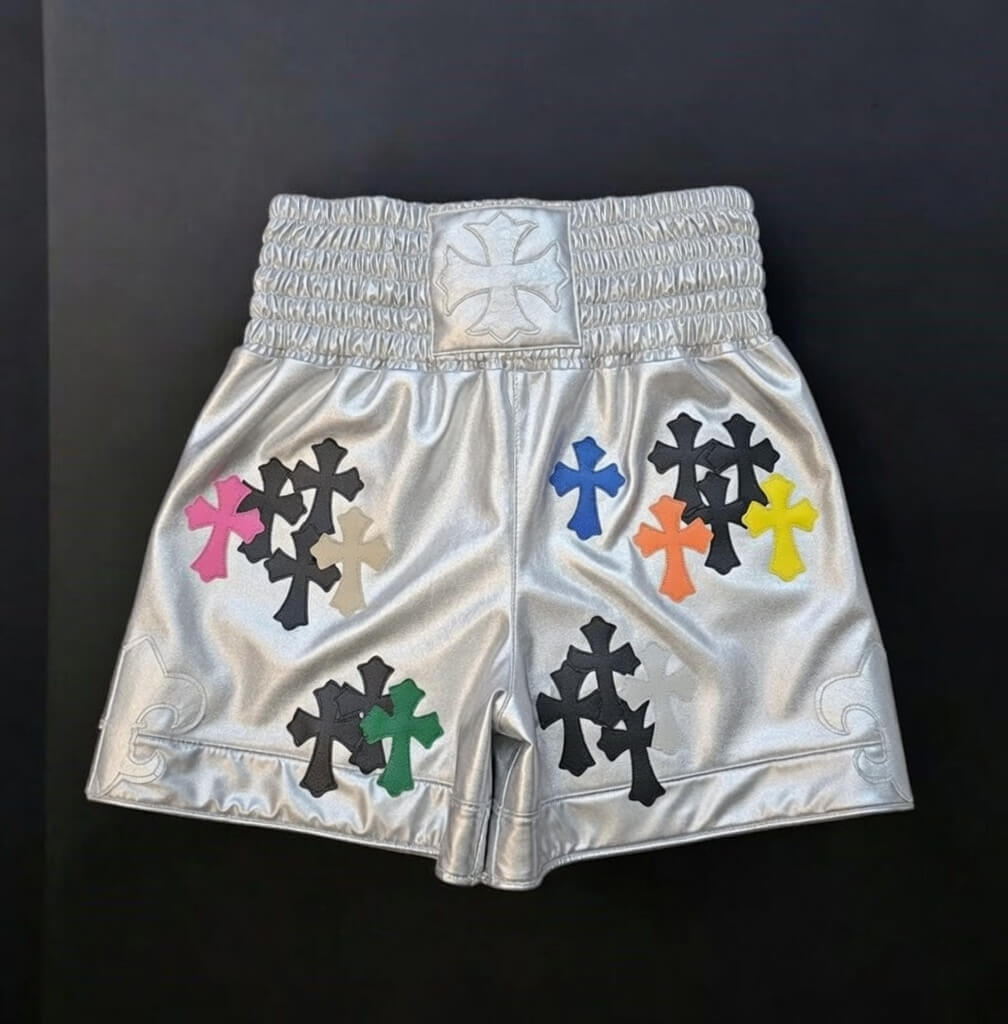Chrome Hearts style silver boxing shorts with silver cross and dagger print front view