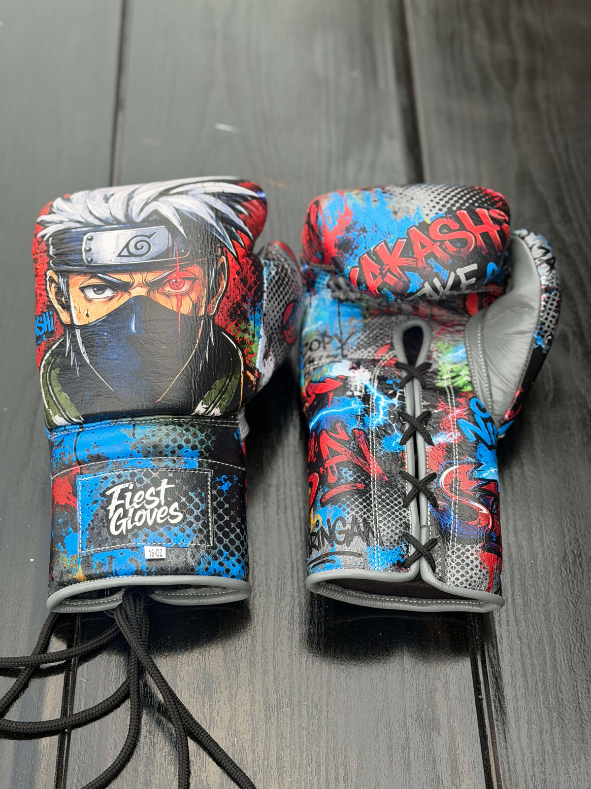 Custom Fiest Gloves boxing gloves featuring an anime Kakashi graphic design with vibrant splashes of color and a lace-up closure Front View
