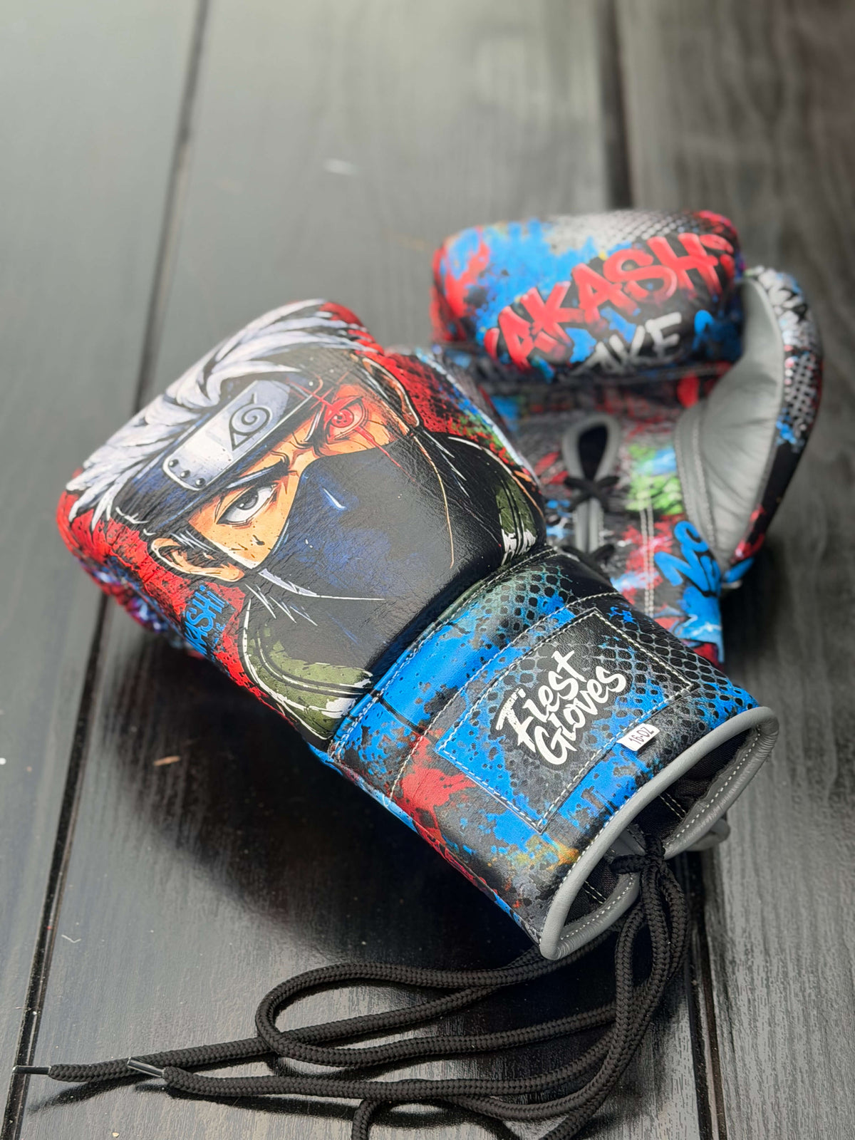 Custom Fiest Gloves boxing gloves featuring an anime Kakashi graphic design with vibrant splashes of color and a lace-up closure
