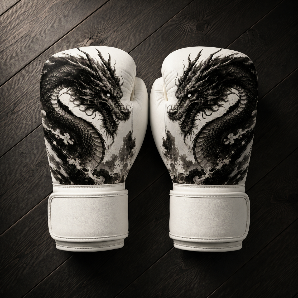 White Fiest Gloves boxing gloves featuring a detailed black ink dragon design resting on a dark wooden surface.