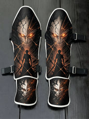 Custom Ichigo Kurosaki with Hollow mask and glowing orange cracks anime design soccer shin guards displayed on a dark surface.