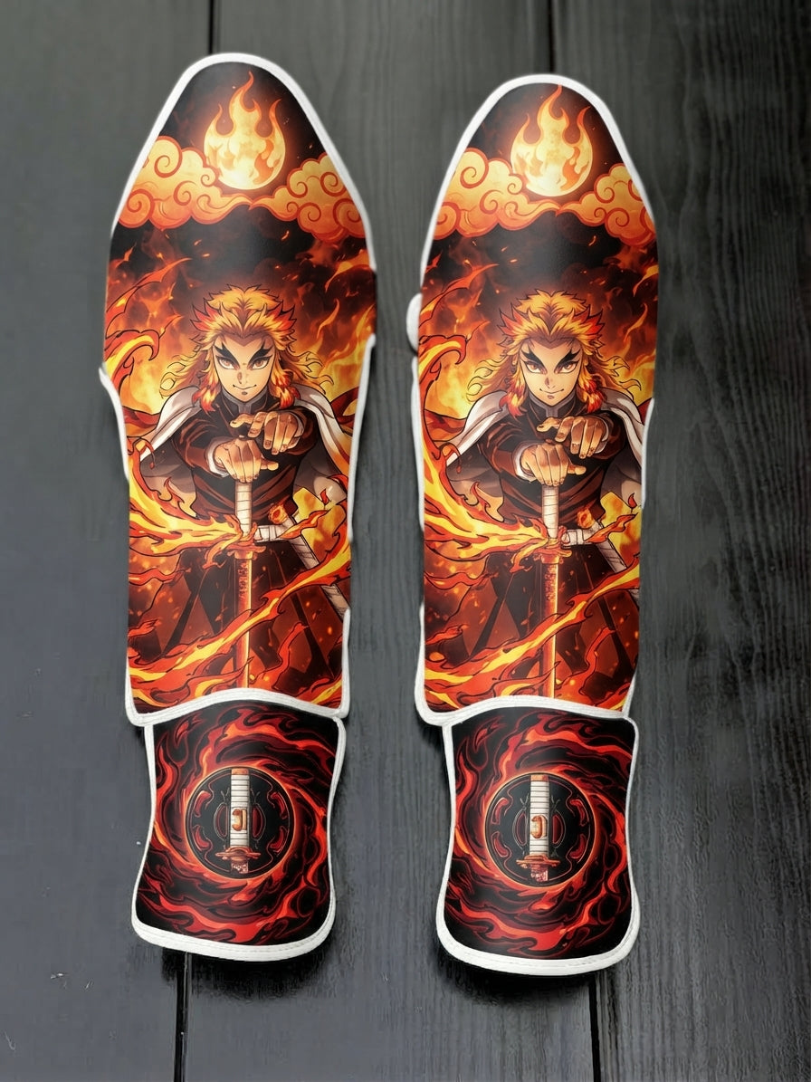 Custom Kyojuro Rengoku Flame Breathing technique anime design with blazing fire and Nichirin sword guard soccer shin guards displayed on a dark surface.