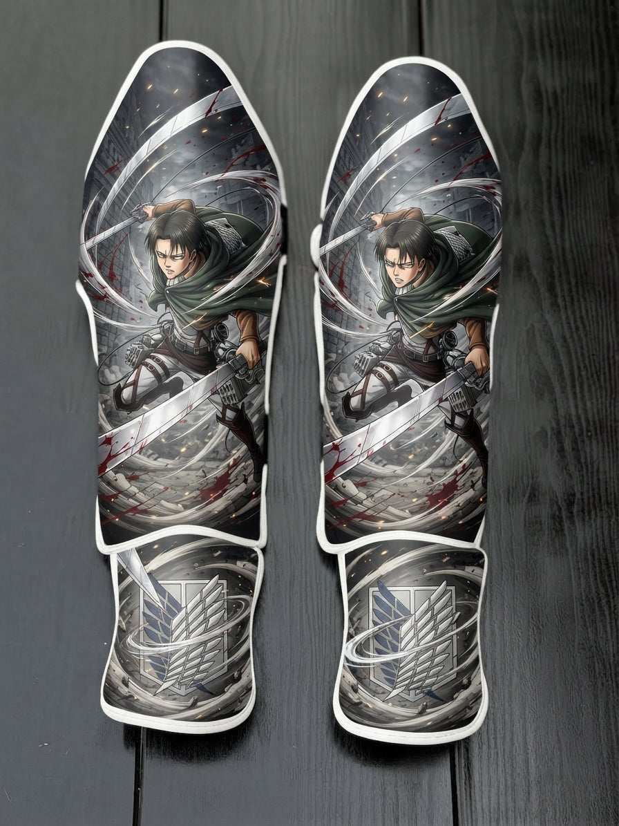 Custom Levi Ackerman anime design with dual blades, spinning slash trails, and Survey Corps wings emblem soccer shin guards displayed on a dark surface.