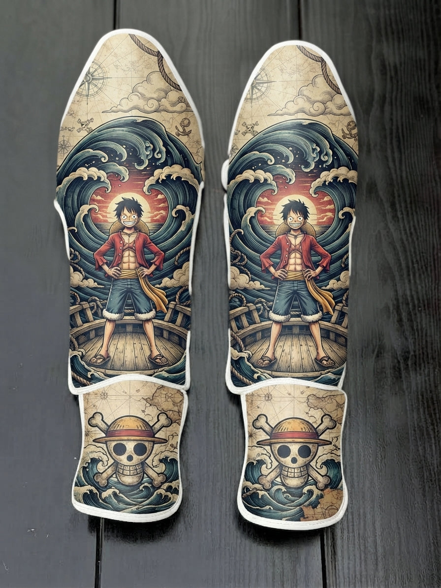 Custom Monkey D. Luffy pirate theme anime design with Straw Hat Jolly Roger soccer shin guards displayed on a dark surface