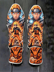 Custom Naruto Uzumaki with Kurama Nine-Tails fox anime design soccer shin guards displayed on a dark surface.