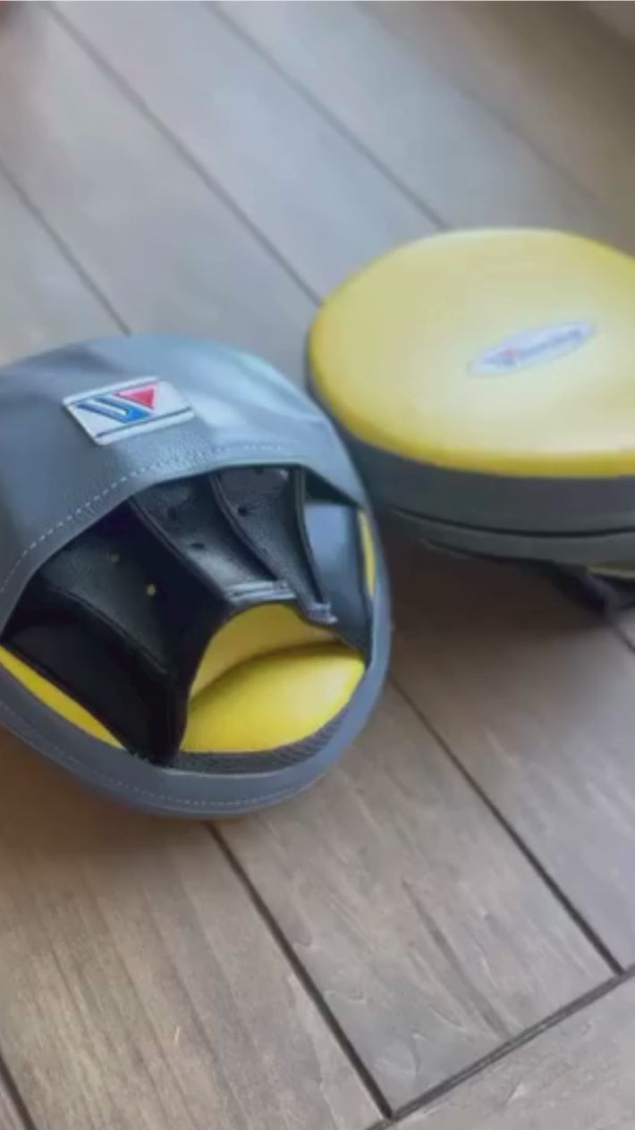 Load video: Winning Punching Mitts | Yellow/Black/Grey