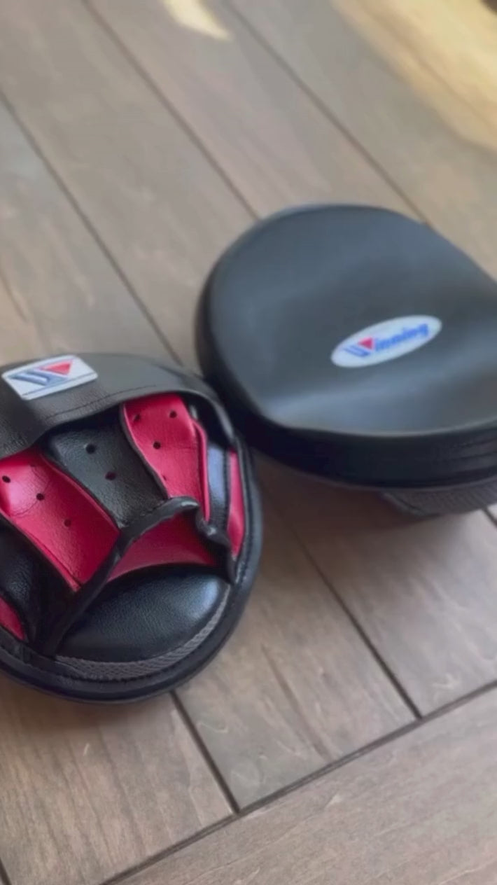 Load video: Winning Punching Mitts | Red/Black