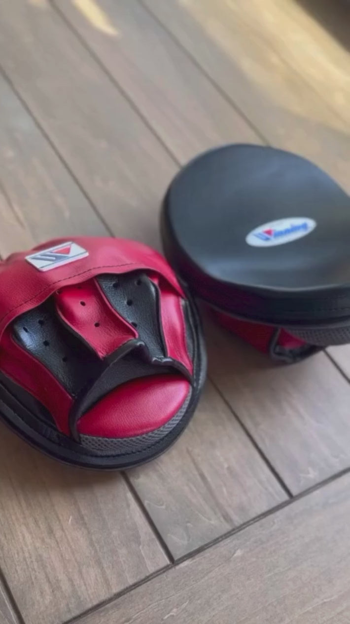 Load video: Winning Punching Mitts | Red/Black