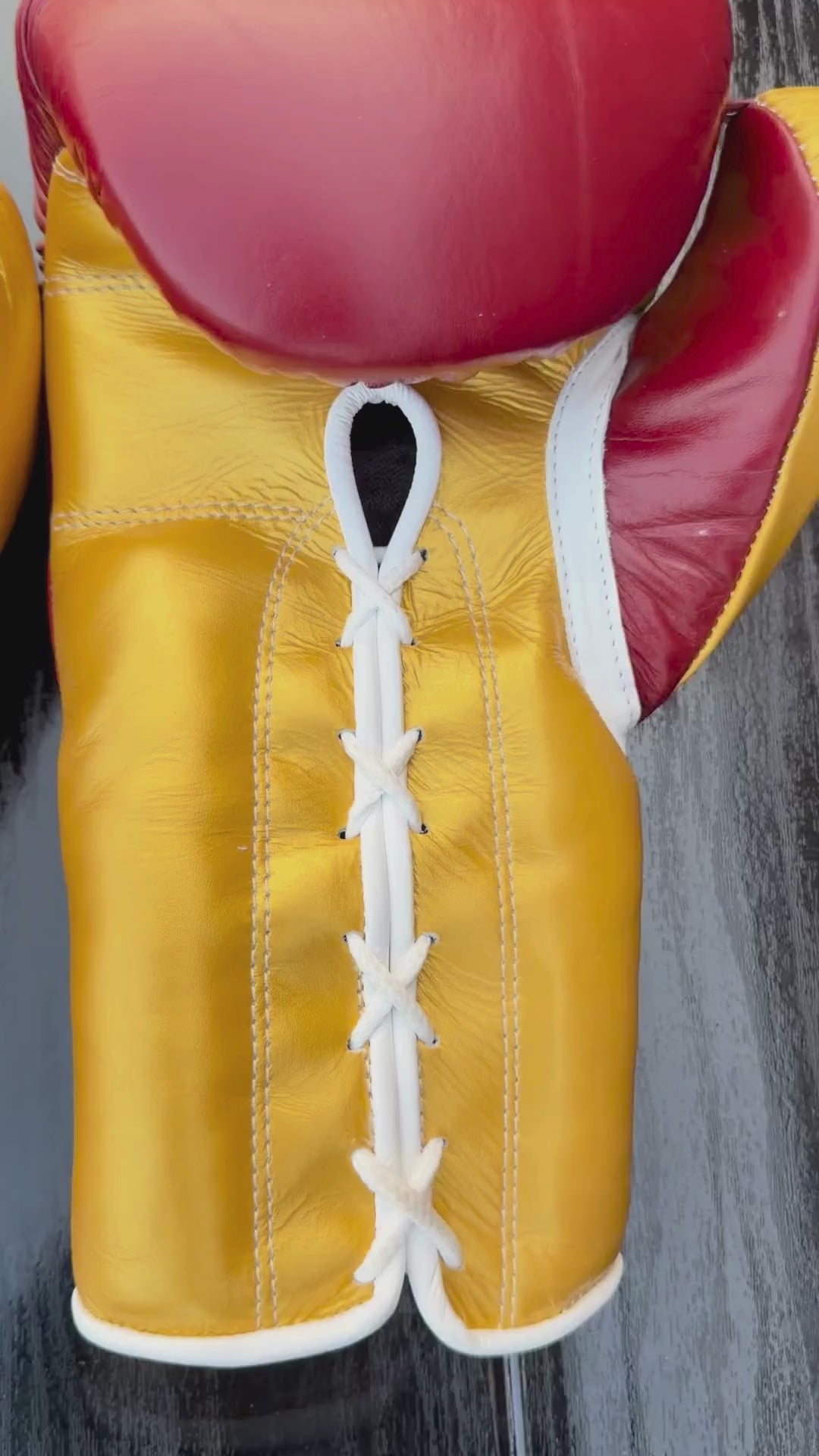 Load video: winning boxing gloves maroon/gold video