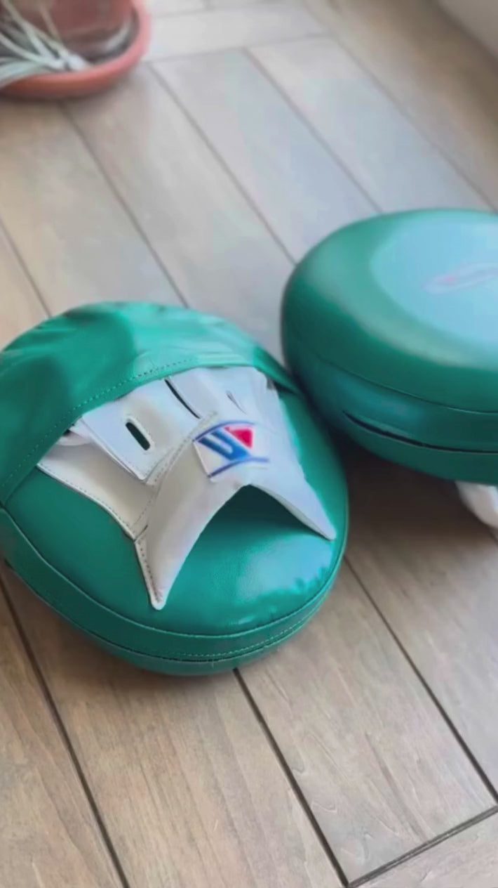 Load video: Winning Punching Mitts | Teal/White