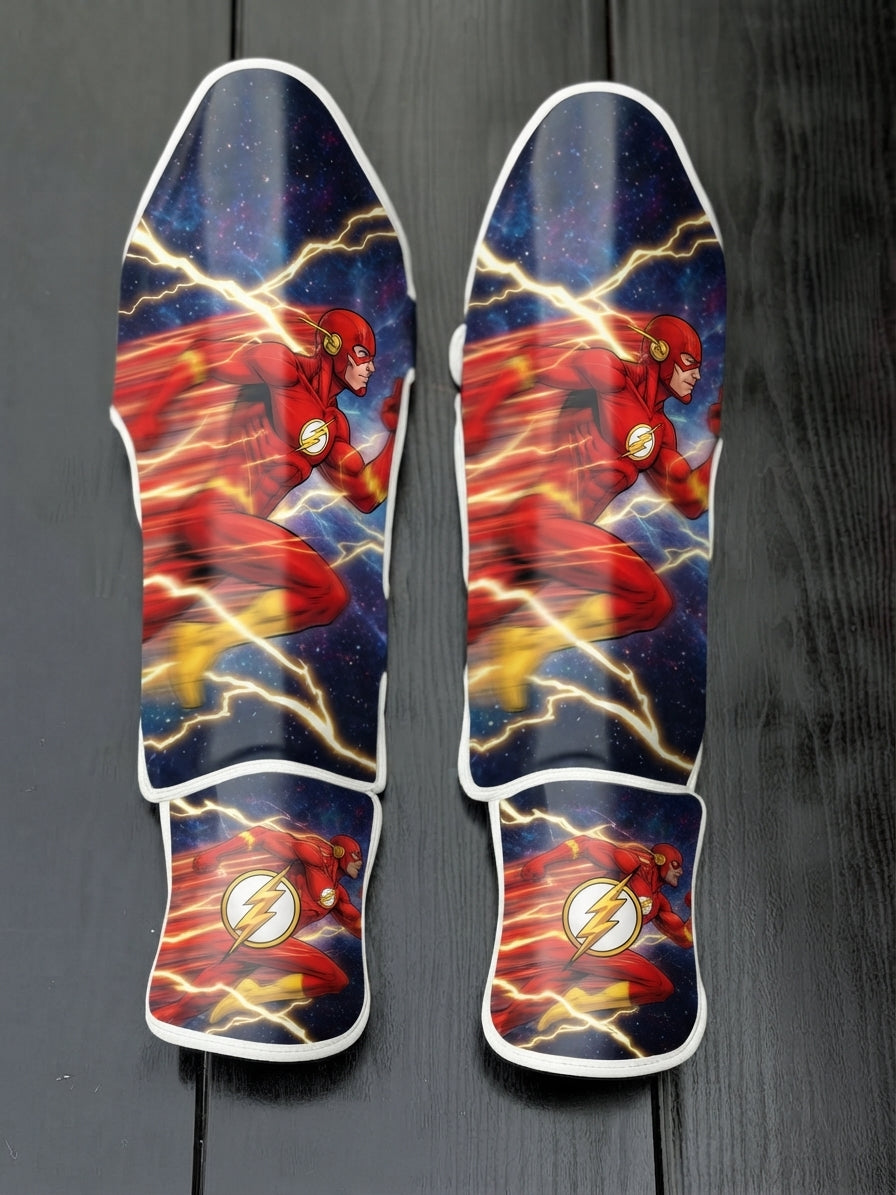 Custom The Flash superhero design with red and yellow suit, Speed Force lightning trails, cosmic background, and lightning bolt emblem soccer shin guards displayed on a dark surface.