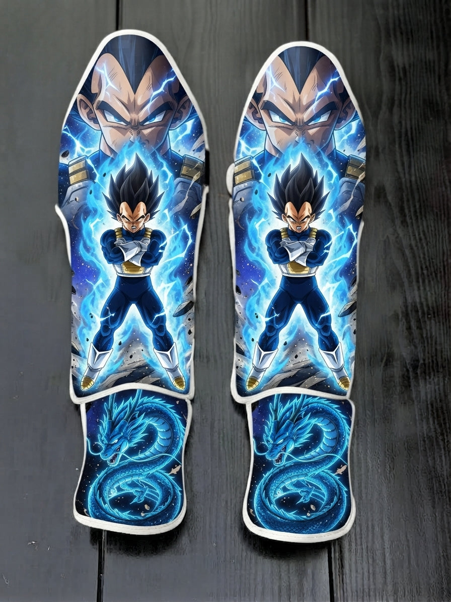 Custom Vegeta with blue energy aura and dragon motif anime soccer shin guards displayed on a dark surface.