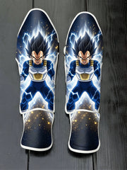 Custom Vegeta anime design with glowing electric aura soccer shin guards displayed on a dark surface.