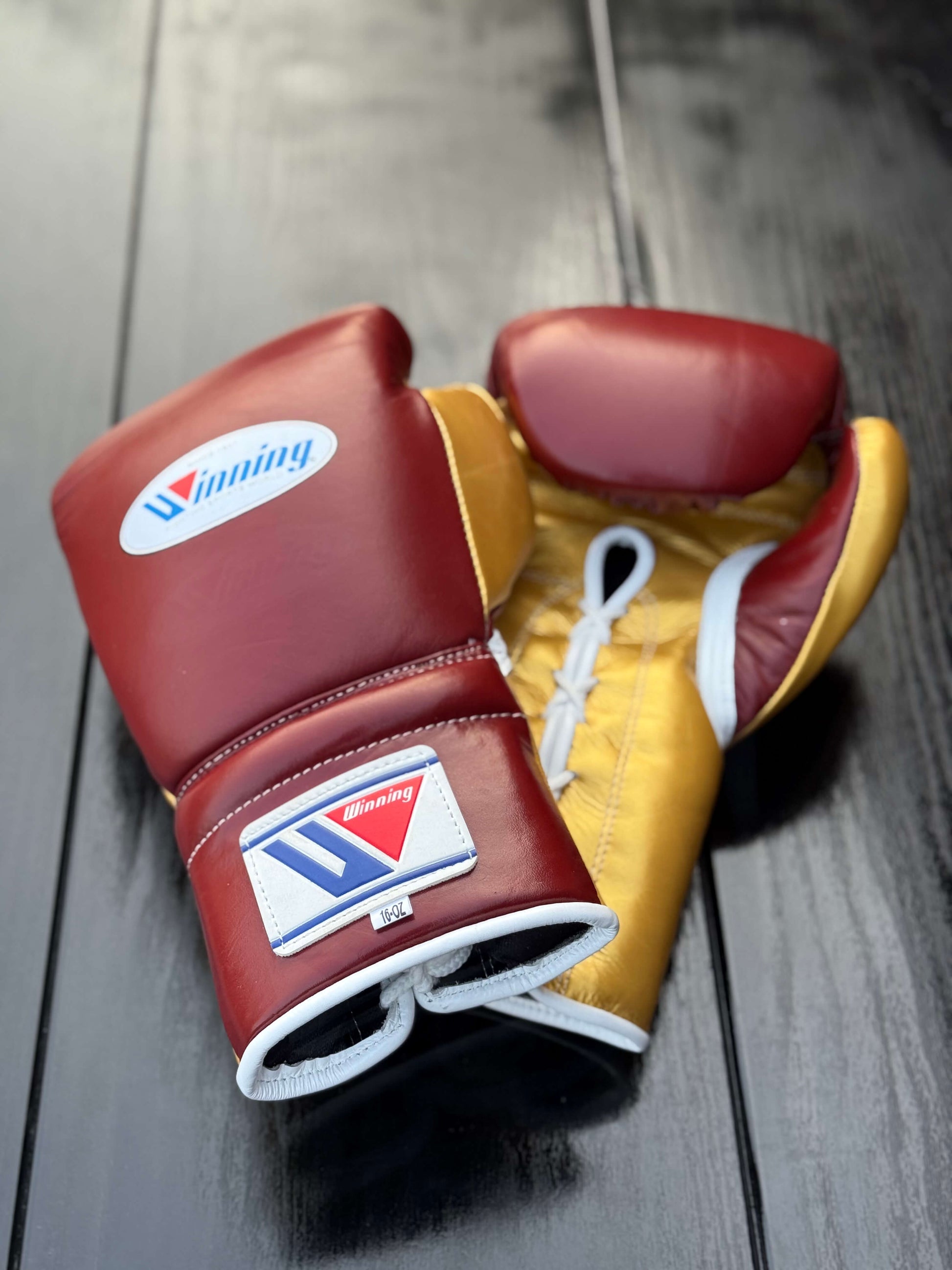 winning boxing gloves maroon/gold front thumb and back view premium leather fight gear