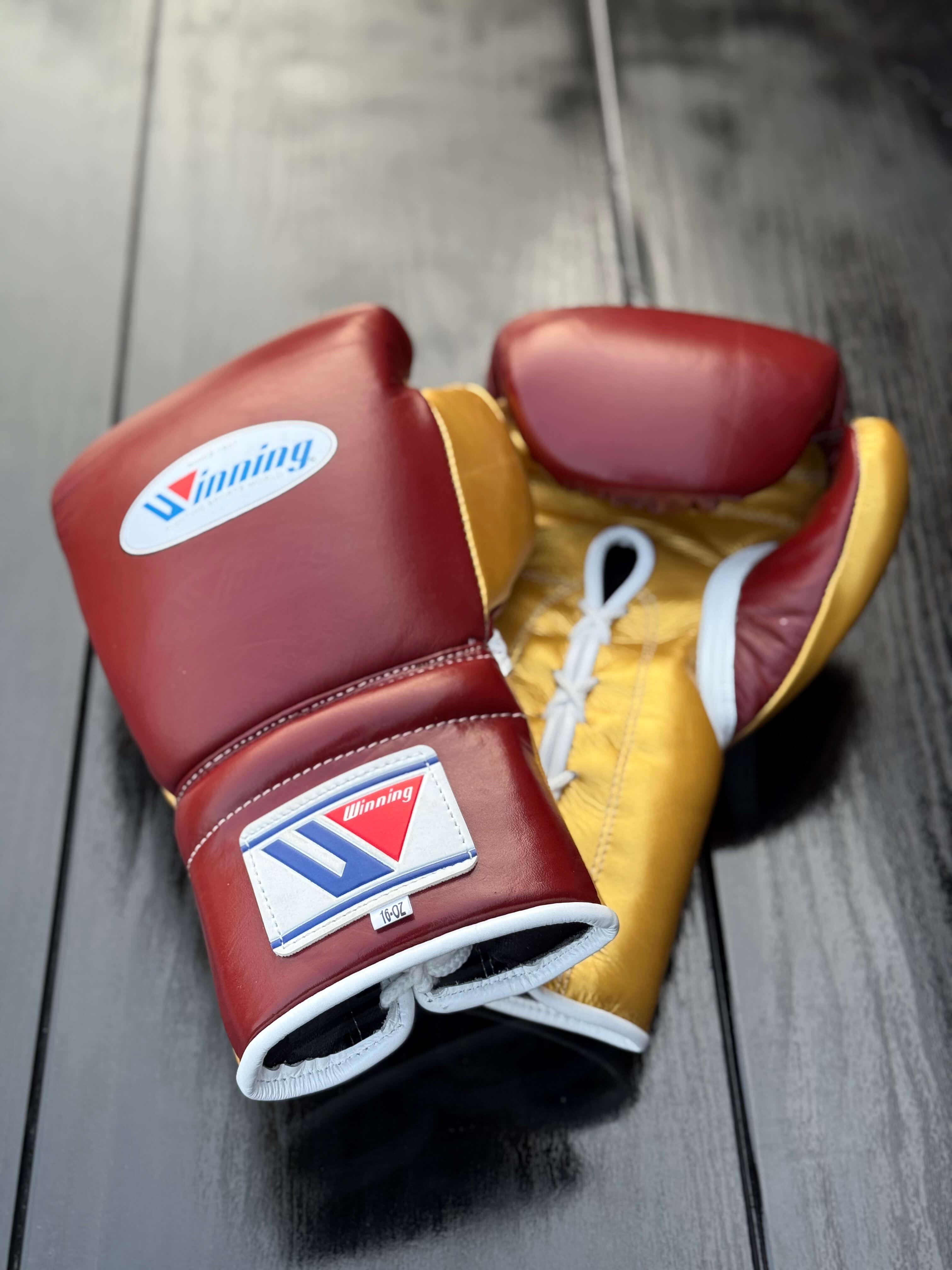 winning boxing gloves maroon/gold front thumb and back view premium leather fight gear